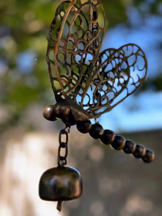 metal dragonfly and bell garden art